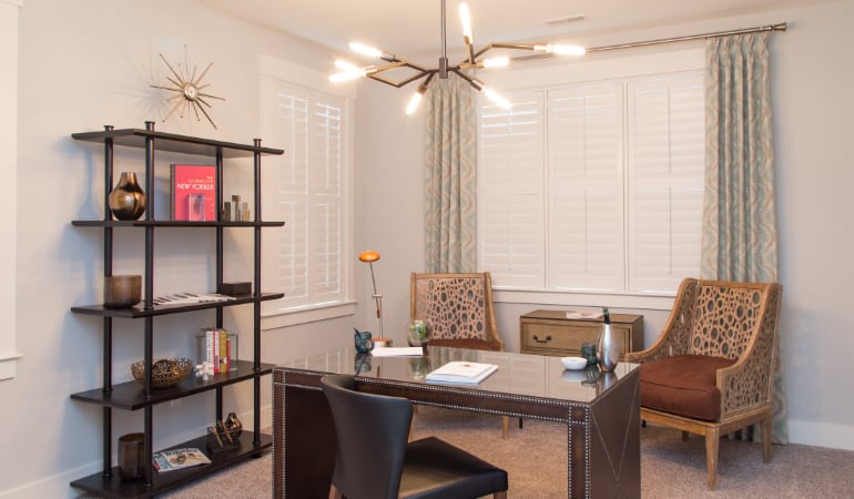 Fort Myers home office with plantation shutters.